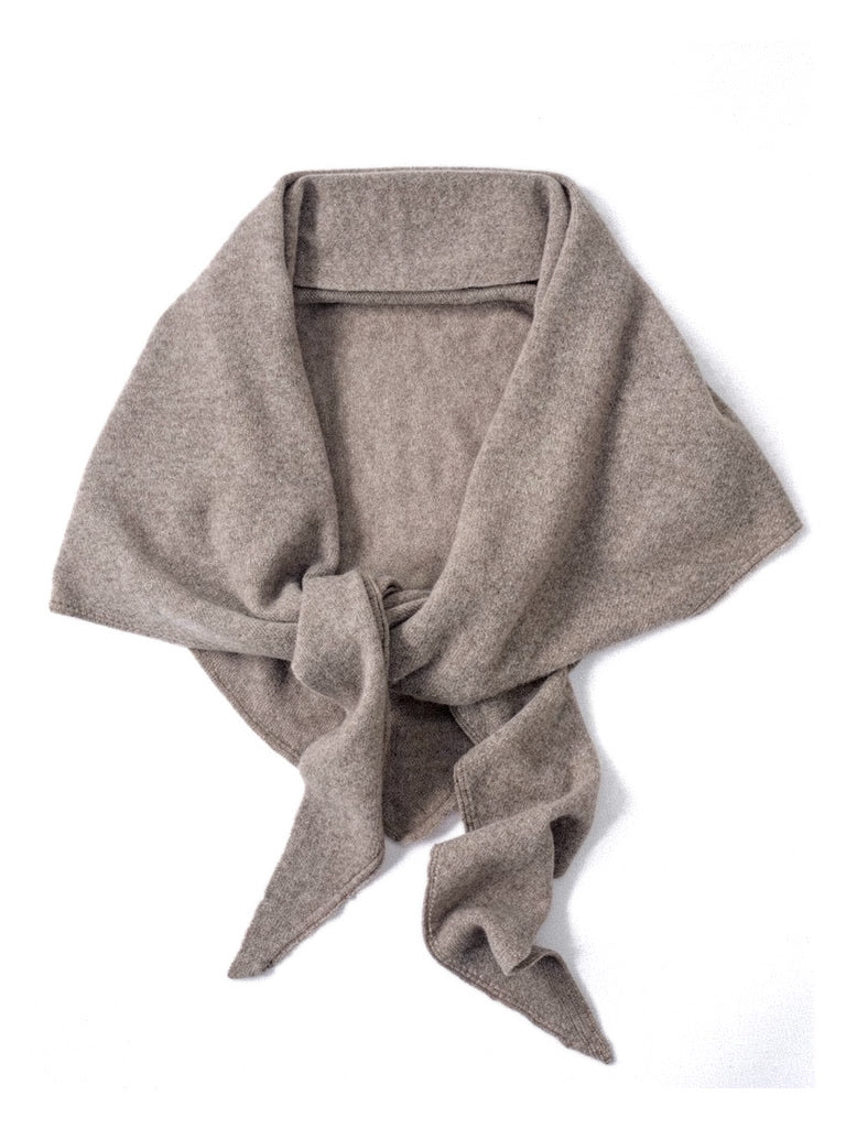 Knitted wool triangle scarf in Moleskin, ends crossed and knotted, shown against a white background